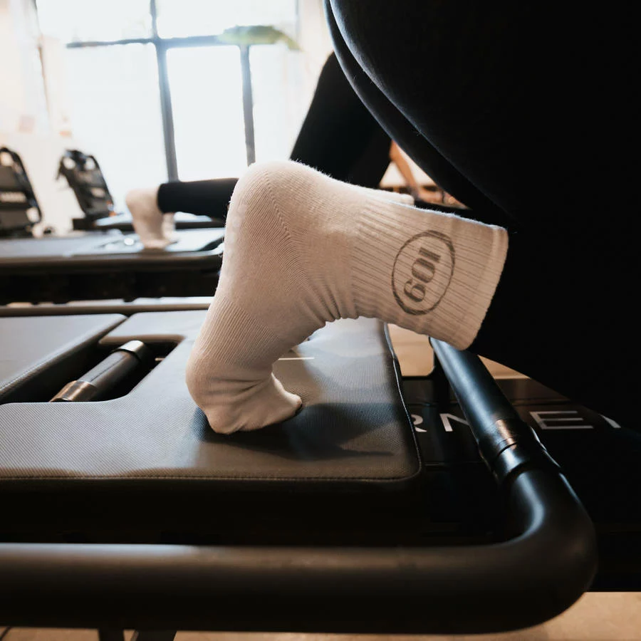 Chaussette antidérapante posée sur la machine